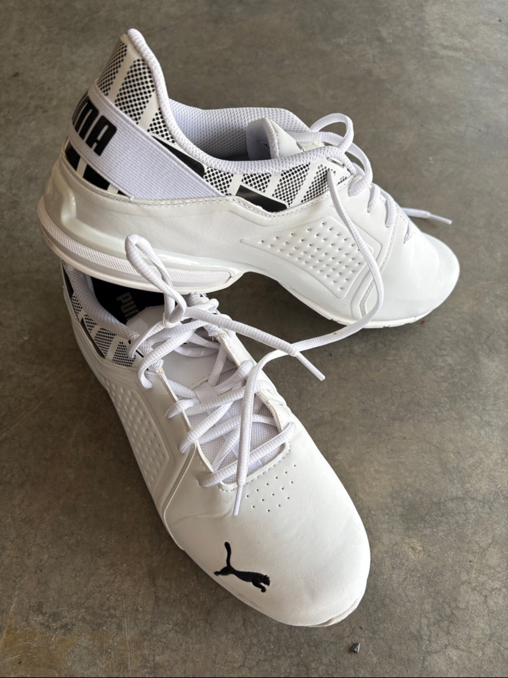Puma Men’s White Athletic Sneakers with Black Logo Accents